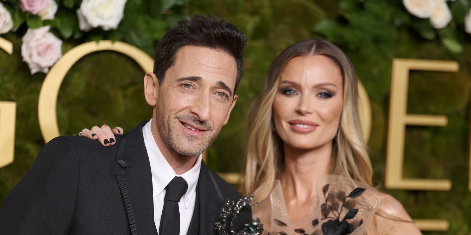 喬治娜·查普曼（Georgina Chapman）對阿德里安·布羅迪（Adrien Brody）和哈莉·貝瑞（Halle Berry）的奧斯卡2025 KISS有最好的反應